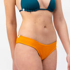 Sustainable Basic Bikini Bottom – Orange/Petrol - SEASICK SWIM